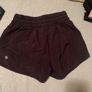 Lululemon black 4” tracker short